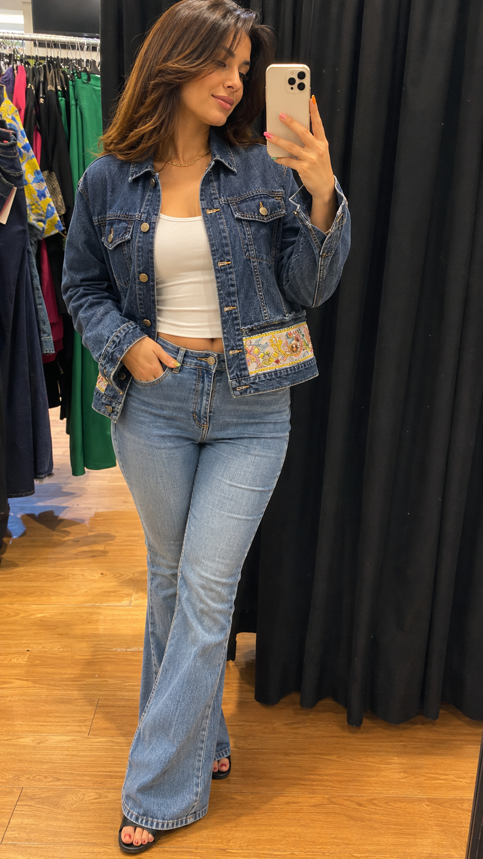 Blue Embellished Denim Jacket styled with flare jeans - front closed view